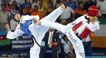 Taekwonda performing a high kick
