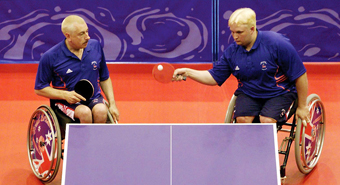 Table Tennis athletes playing doubles